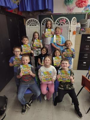 Mrs. Lanning’s K+ class would like to say a big thank you to Pam Simmons and Wichita Insurance for their new book “Ten Lucky Leprechauns.” Each student received their very own copy to keep. These students have been blessed each month with a new book from Wichita Insurance to help practice their reading skills and to build their very own library at home.