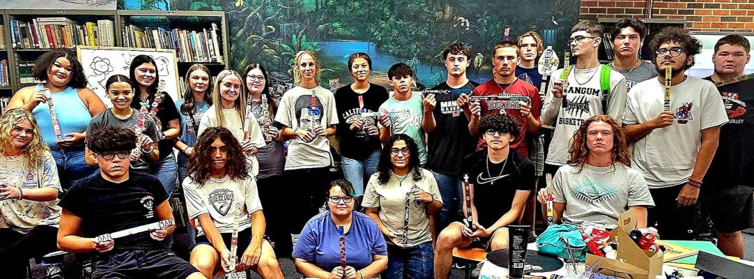 The Mangum AP Art students showed their creativity on their personal history totems. Their canvas this time came as paint sticks donated by Ace Hardware.