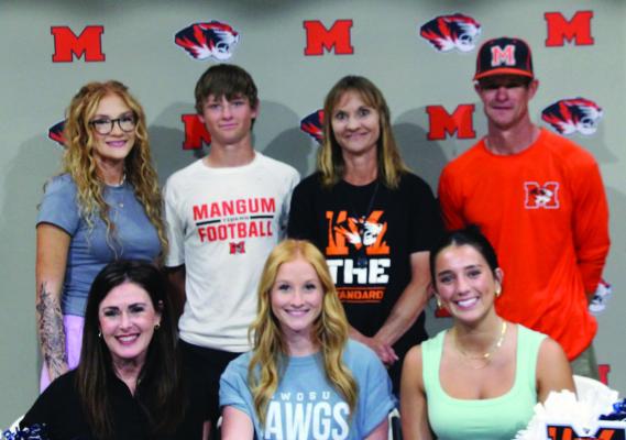 Congratulations to Jaylyn Hamon. She signed to be on the cheerleading squad at SWOSU. On the back row (l-r) are Makayla, Derek, Holly, and Dirk Hamon. On the front row (l-r) are Heather Caskey, MHS cheerleading sponsor, Jaylyn, and Aubree Hernandez, representing SWOSU.