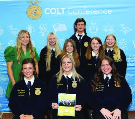 The MHS FFA officers attended the annual Colt Conference at Lawton. Those attending were (back row l-r) Hannah Warneradvisor, McKenzie Mills-Secretary, Katy Derr-Vice-President, Jake Green-Reporter, Kelli Slaton-Treasurer, Ella Hart-Sentinel, and in the front row is Morgan White-President (center) sitting between two state officers.