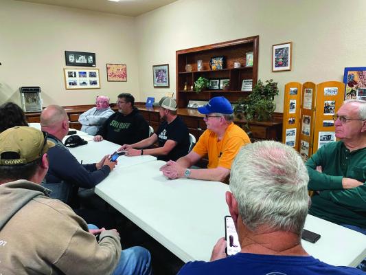 Greer County Sheriff Steve McMahan talks with concerned citizens about a new jail site at a special ad-hoc meeting Monday at the Greer County Chamber of Commerce Welcome Center. Mike Bush | Mangum Star